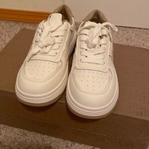 Brand new sneaker with white  and brown color